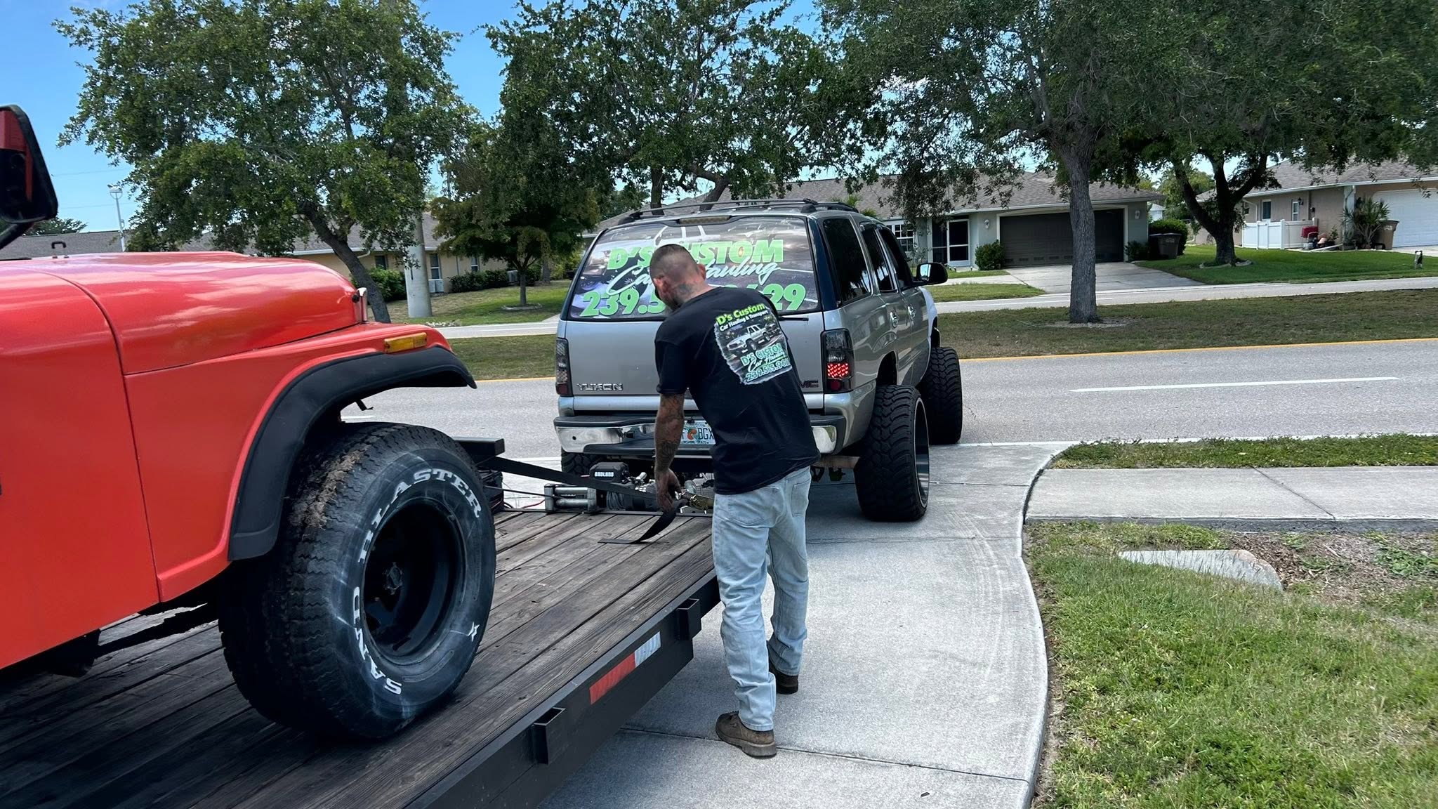 Classic Jeep carefully loaded with professional tie-down equipment.