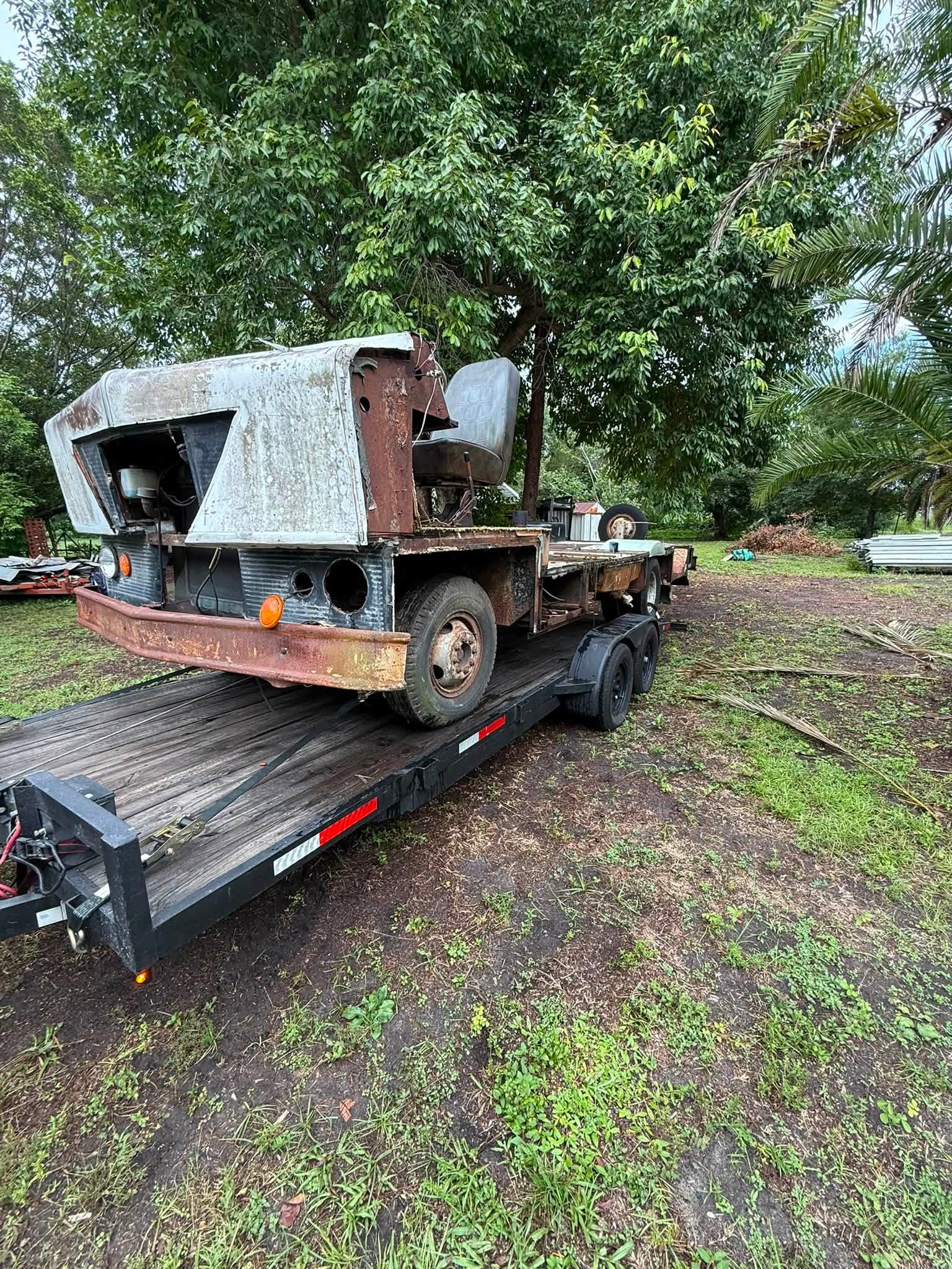 Vintage project truck transported carefully for restoration.