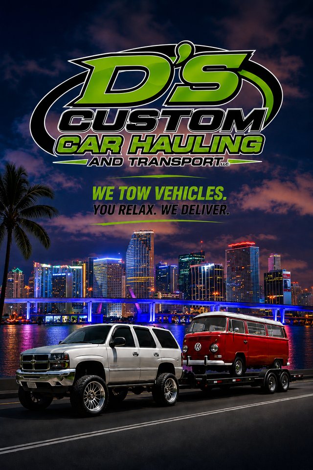 D'S Custom Car Hauling and Transport truck hauling a lifted SUV and classic VW van at night in front of the Miami skyline.